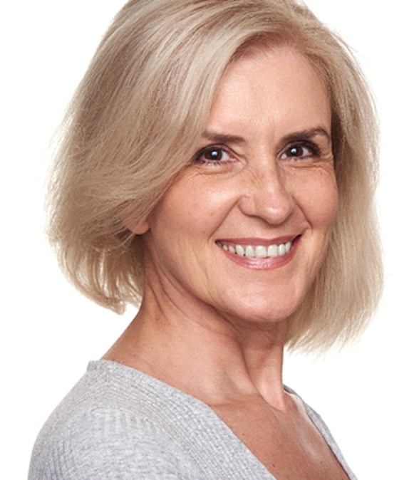 Smiling older woman with All on 4 in Dallas