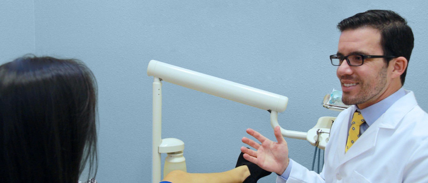 Doctor Barnett talking to a patient