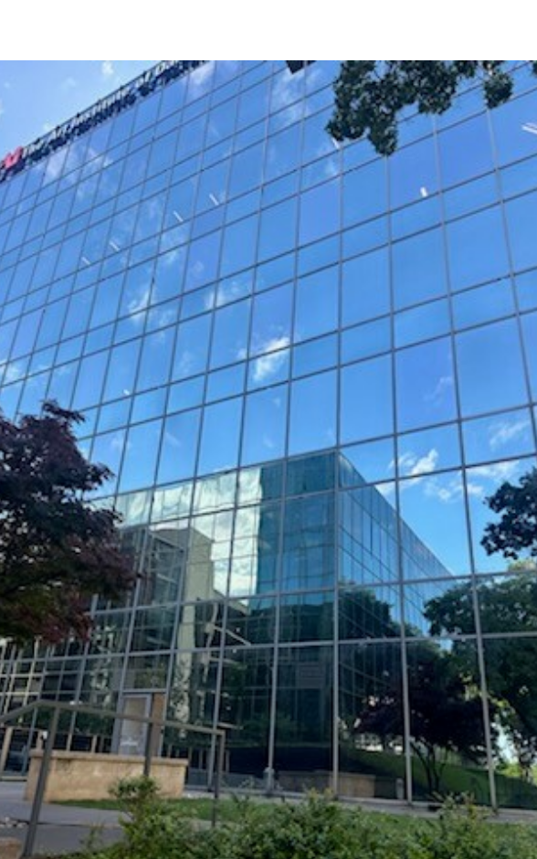 Outside of glass building of Dallas periodontal office