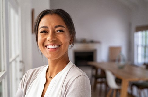 Woman at home smiling