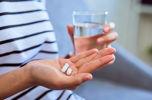Person taking pain medication