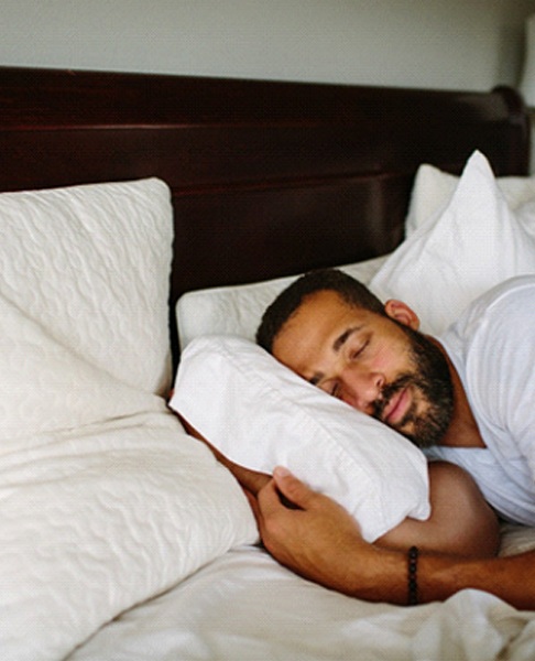 Man sleeping peacefully on his side